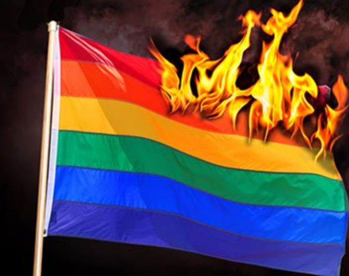 Chicago Priest Sets Rainbow Flag On Fire In Church “Exorcism” Ceremony