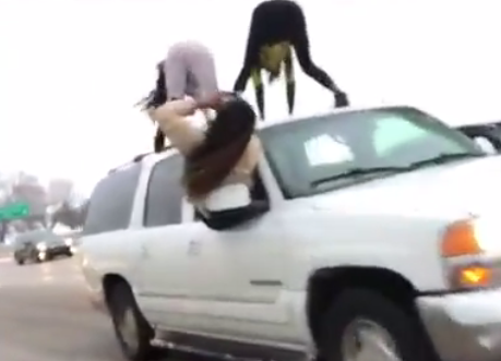 Women Caught Twerking Atop SUV During Traffic Jam On Freeway