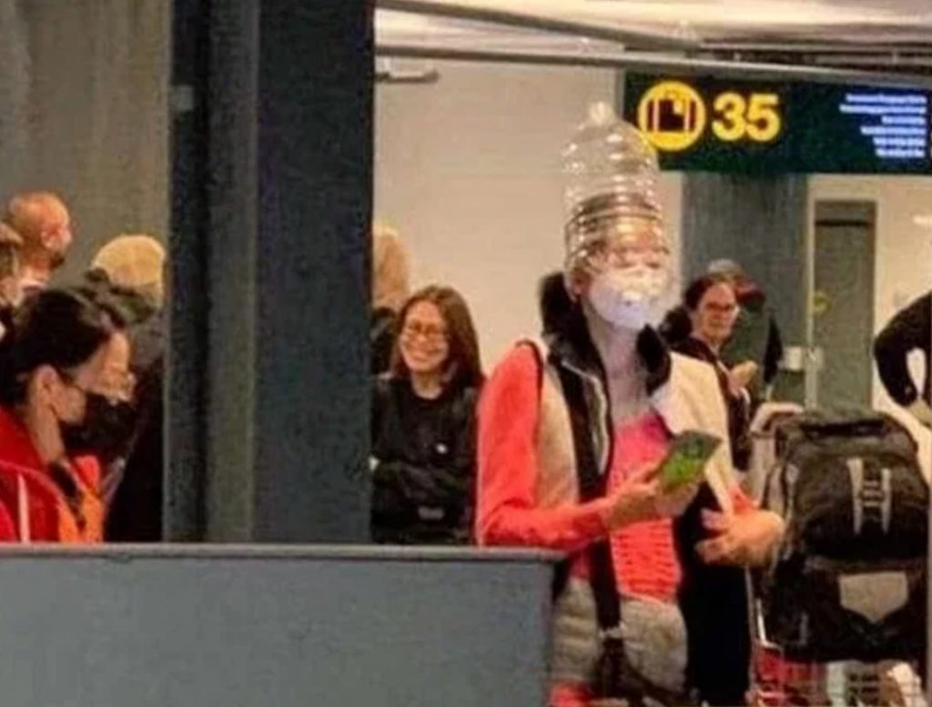 Fearful Airline Passengers Wear Bottles On Heads, Plastic Bags To Avoid Coronavirus