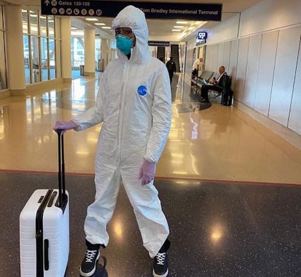 Naomi Campbell In Hazmat Suit And Mask At Airport