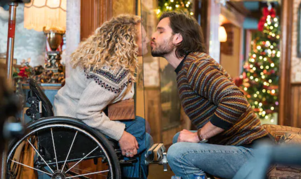 Actors Attempt To Avoid COVID-19 By Kissing Through Plexiglass In Lifetime Holiday Movie