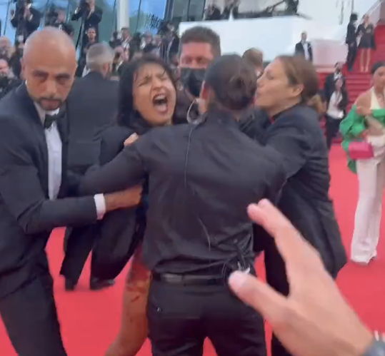 Naked Woman Crashes Cannes Red Carpet While Screaming “Stop Raping Us!”