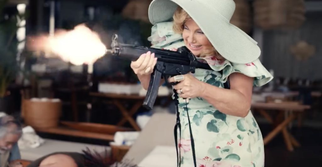 J Lo Rom-Com <em>Shotgun Wedding</em> Features Jennifer Coolidge Firing A Machine Gun