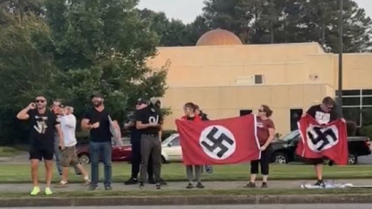 Neo-Nazis Wave Swastika Flags Outside Georgia Synagogue