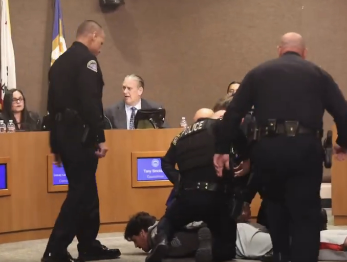 Former NFL Player Arrested During Huntington Beach, CA City Council Meeting For Protesting Grotesque MAGA Library Plaque