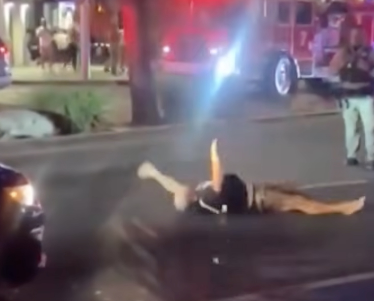 Man Rolling Around Santa Monica Blvd. In West Hollywood Stops Traffic